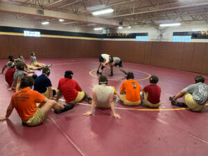 Coach Matt instructing practice session